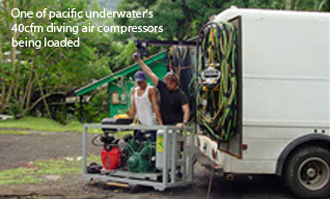 One of pacific underwater's 40cfm diving air compressors being loaded